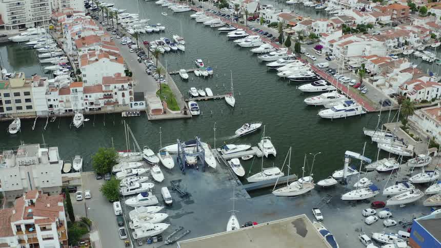 Hundreds of boats are parked at a large marina