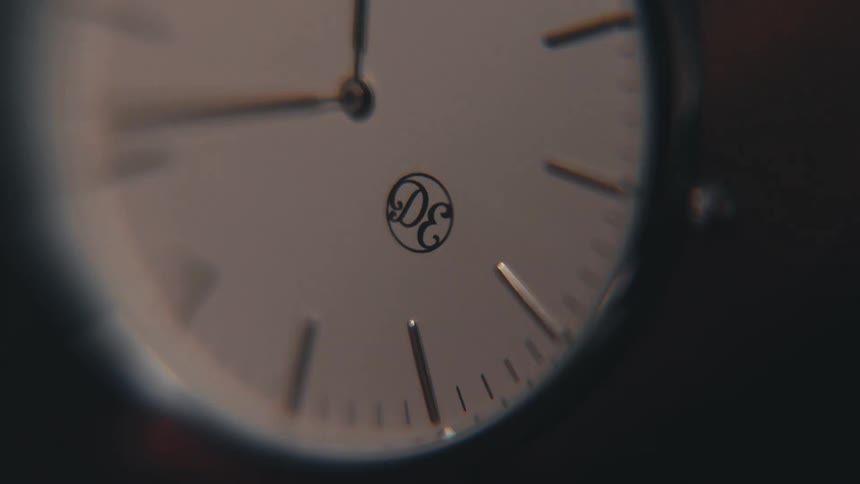 Light shining on an analog clock