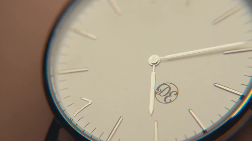 Close up of a watch on a persons arm
