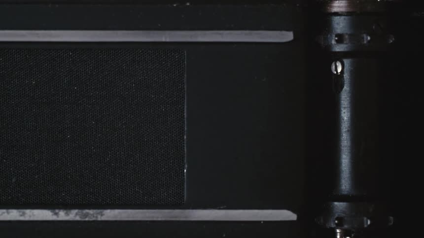 A close up of a camera advancing film