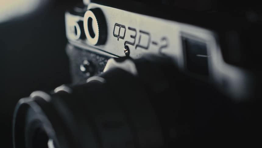 Letters top portion of camera over lens