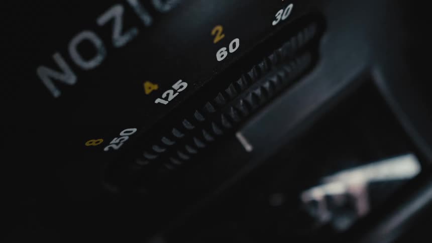 A knob and numbers on a photography camera