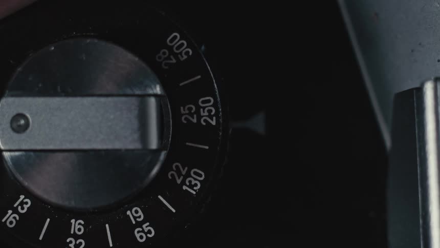 A camera with a dial with numbers