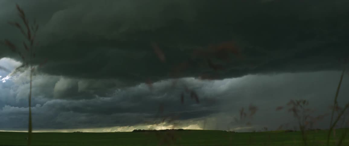 A storm is forming in the sky at dusk