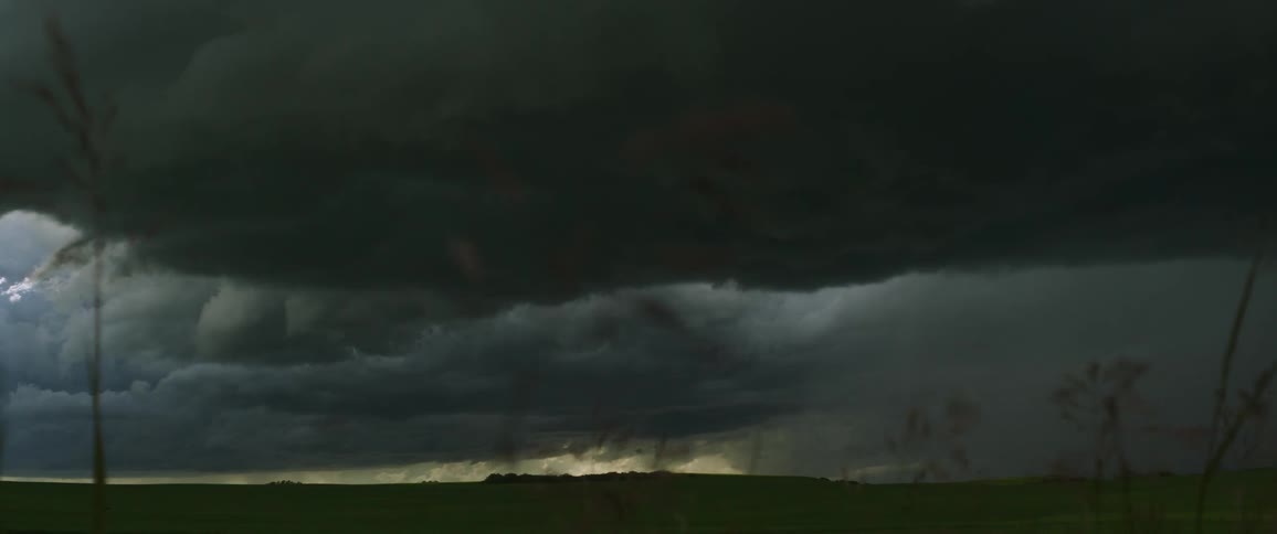 Storm clouds over a field