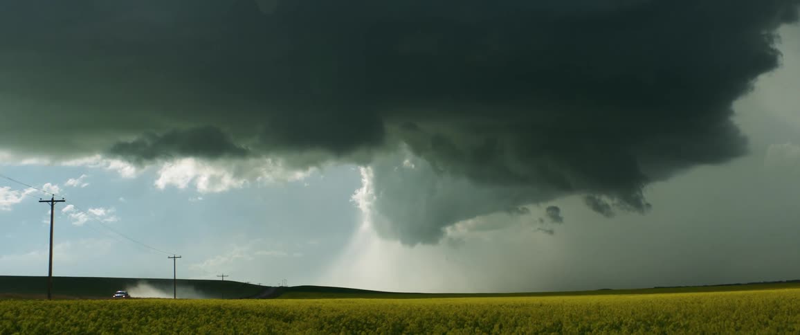 A car is driving through a storm