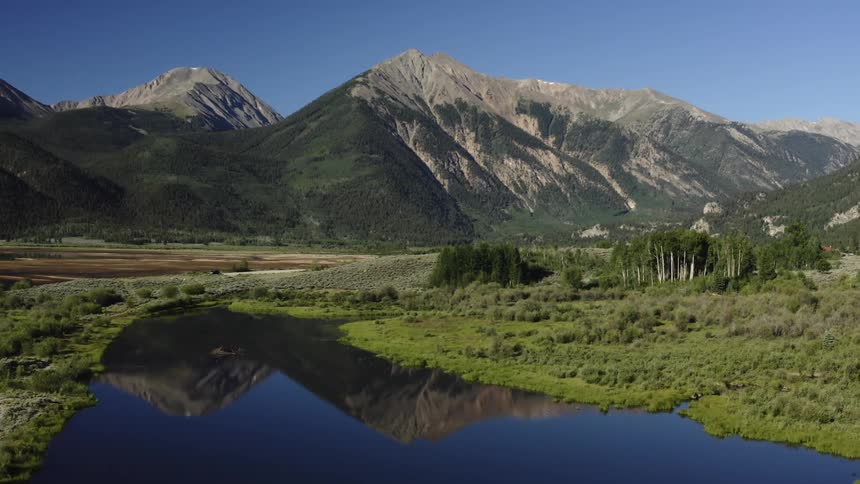 A mountain is displayed in the landscape during spring