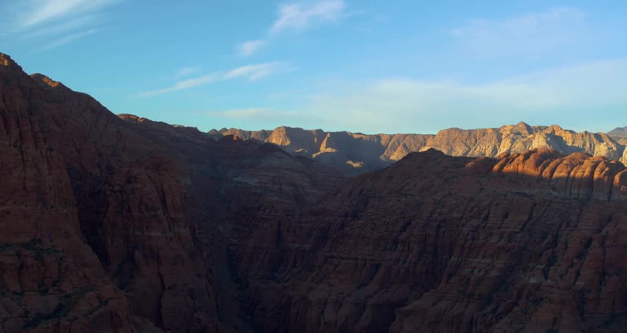 An aerial view of rocky mountains in nature in the daytime