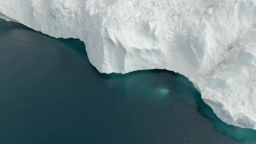 Aerial view of an arctic area is displayed