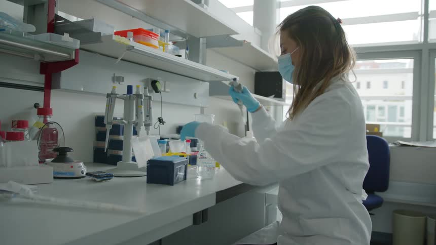 A woman is working in the lab