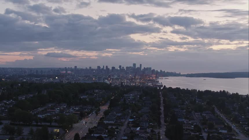 Aerial wide of downtown vancouver city skyline and harbour