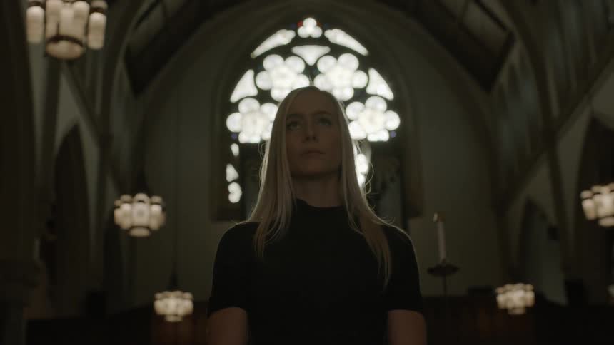 A woman standing in a church
