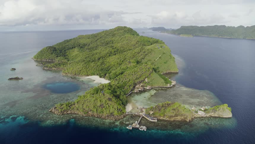 Aerial view of islands are displayed by the ocean