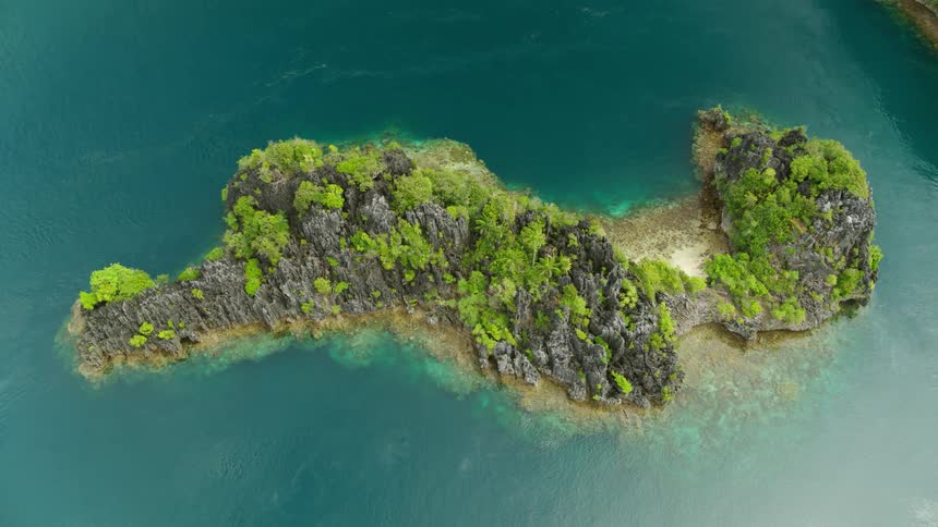 An aerial view of an island in the water