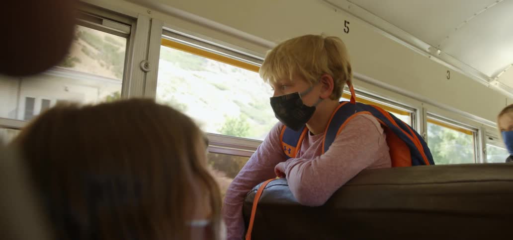 Children move around on the traveling school bus
