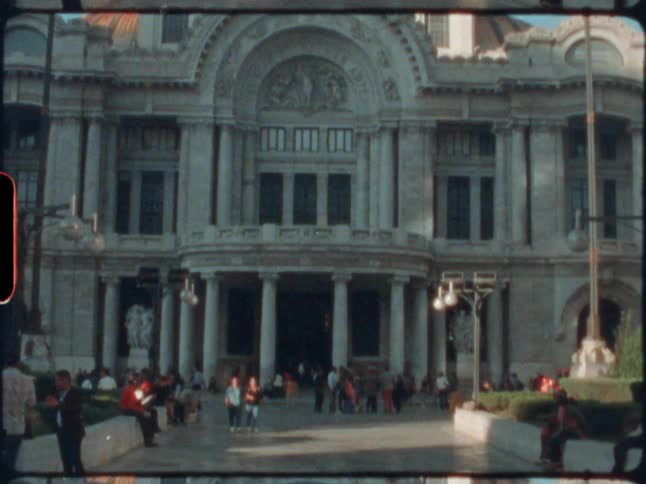People are touring around the domed building