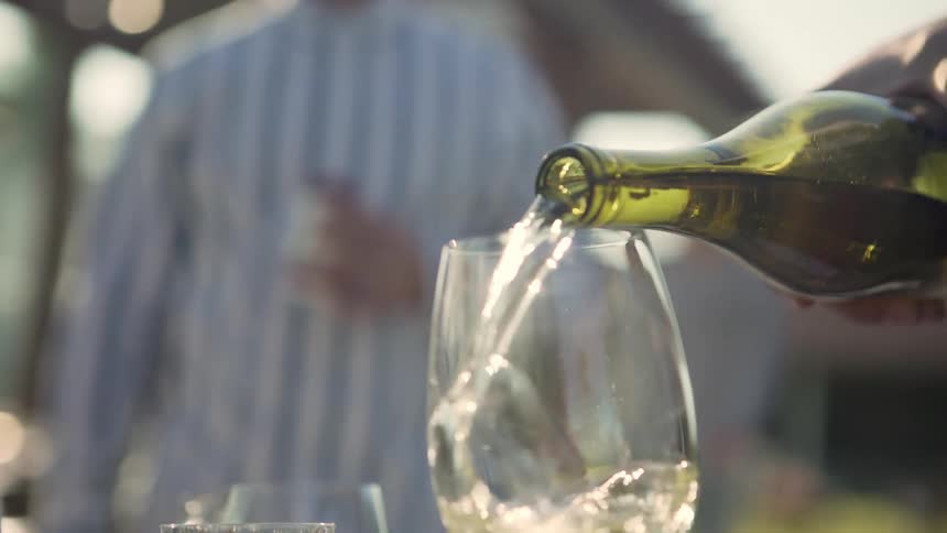 Wine is being served to people outside