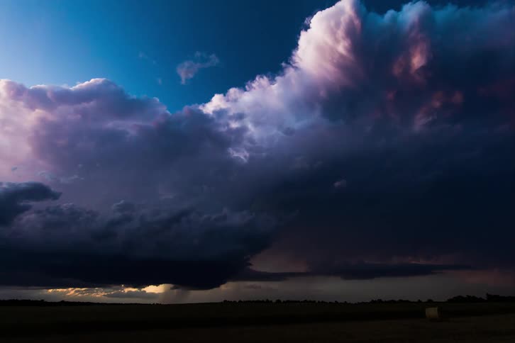 Pink lightning coming from clouds