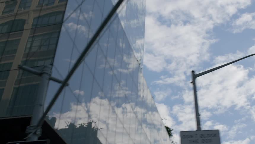Close up of a building with reflective windows