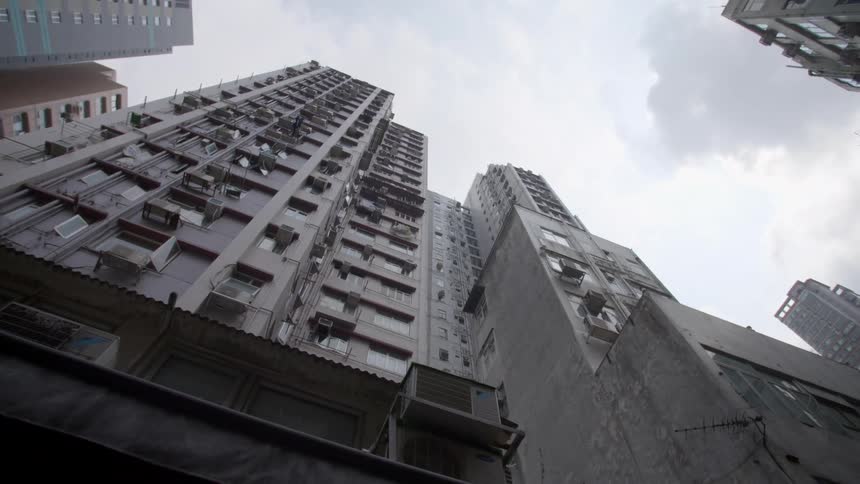 Buildings in a city are displayed during the day