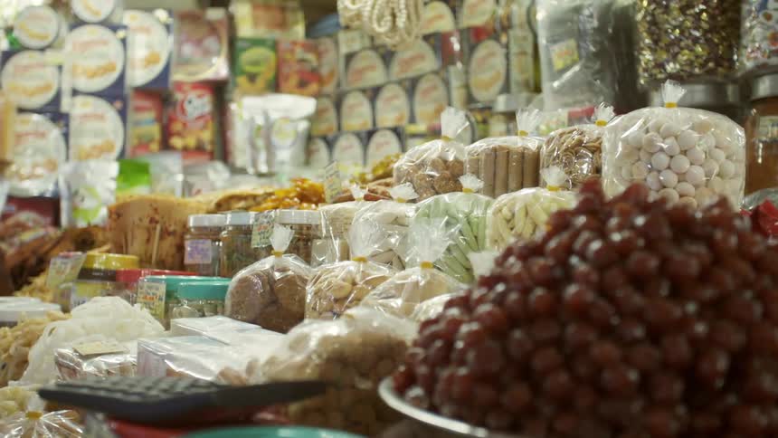 Snacks and wrapped goods are crammed closely together in store