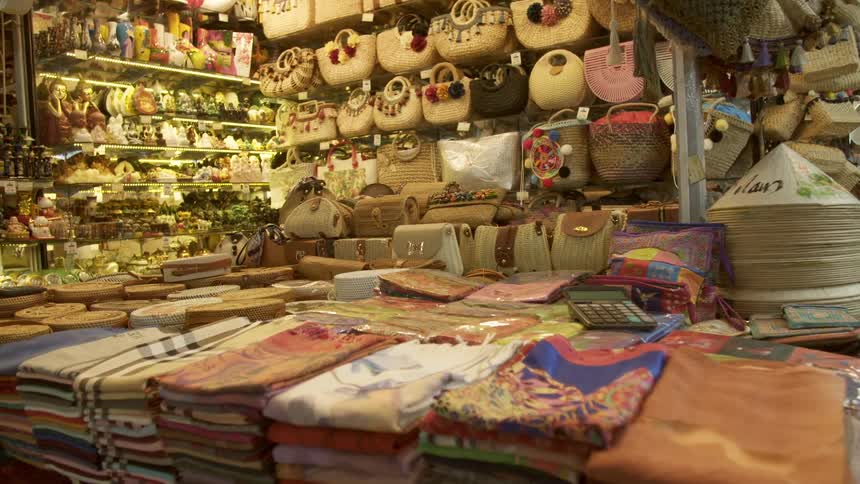 Street market displays bags and scarves