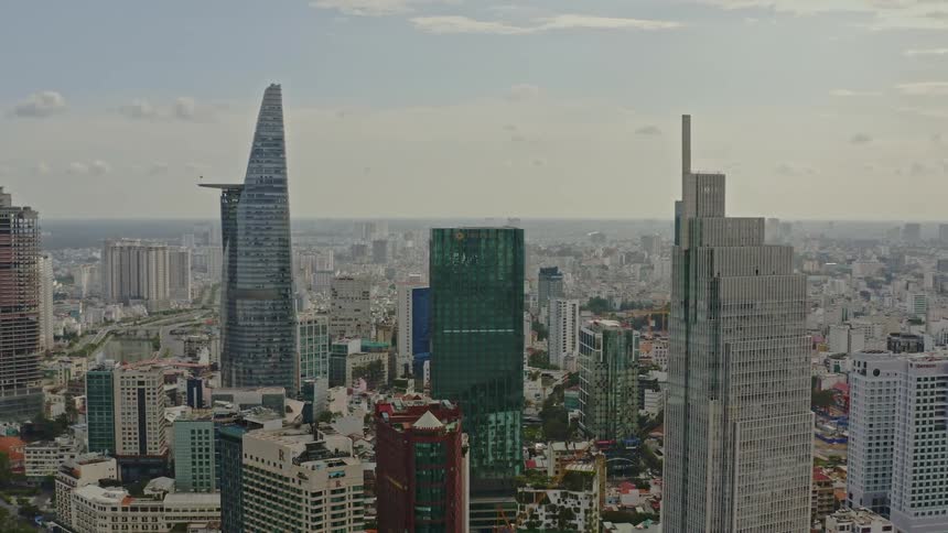 Aerial view of a downtown city is displayed