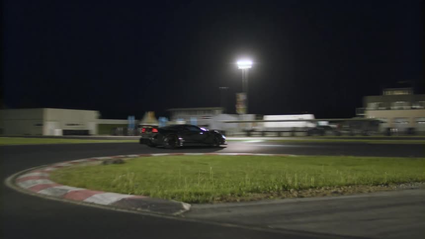 A car racing around a track