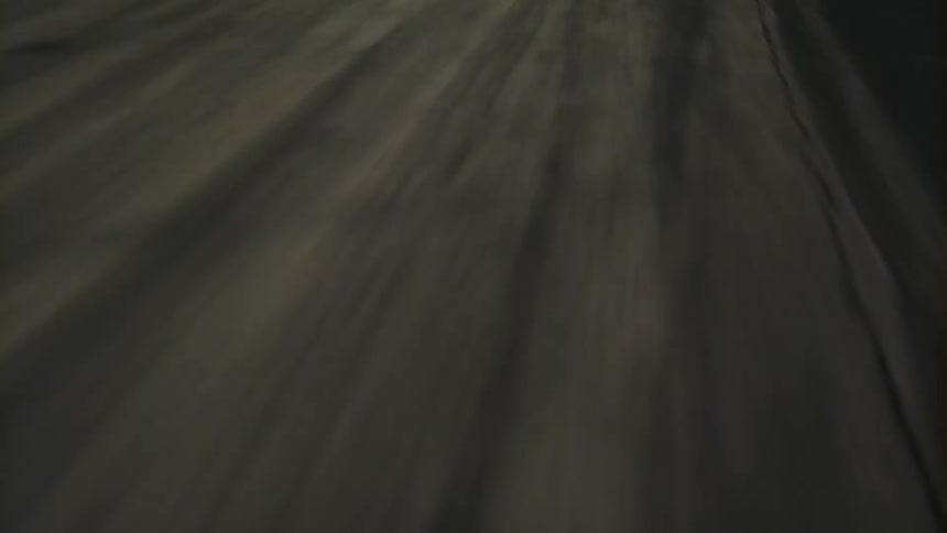 A road with dust and safety cones