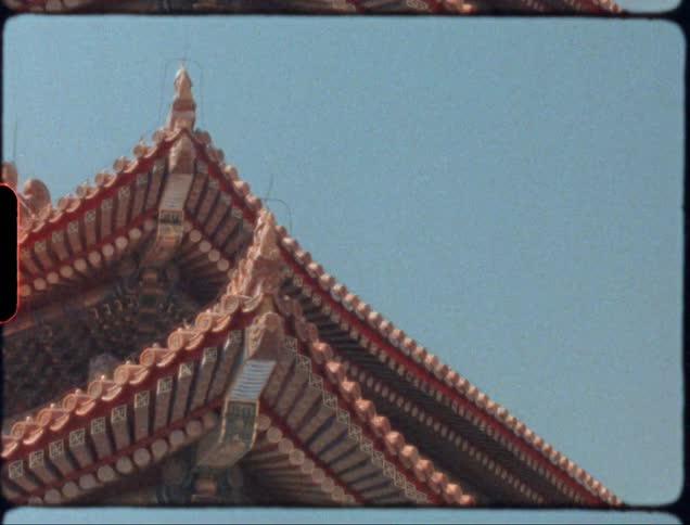 Exterior of a pagoda roof at the very top at peaks