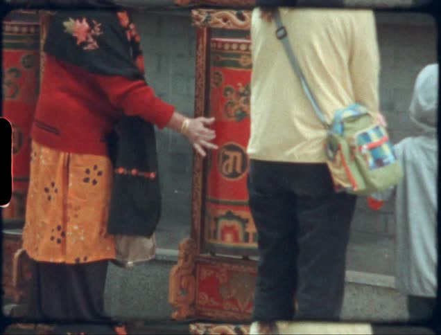 Group of people looking at ancient buildings