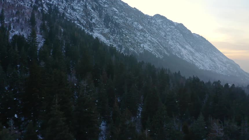 Aerial view of mountains are displayed at dusk
