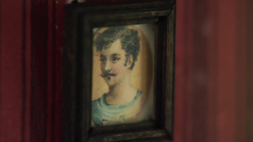 A picture frame on a wall in a room