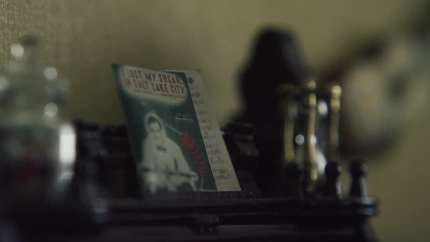 Sheet of music on top of cabinet