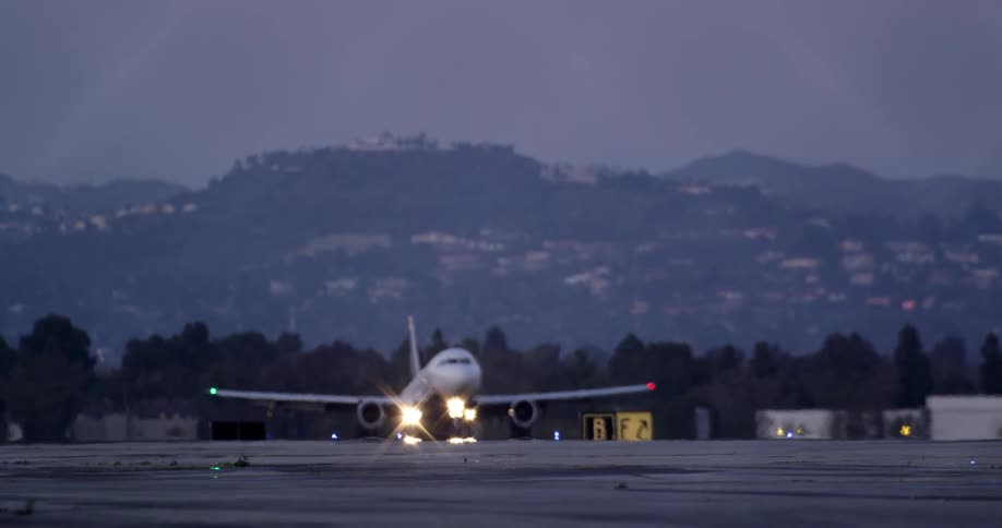 An airplane landing at an airport