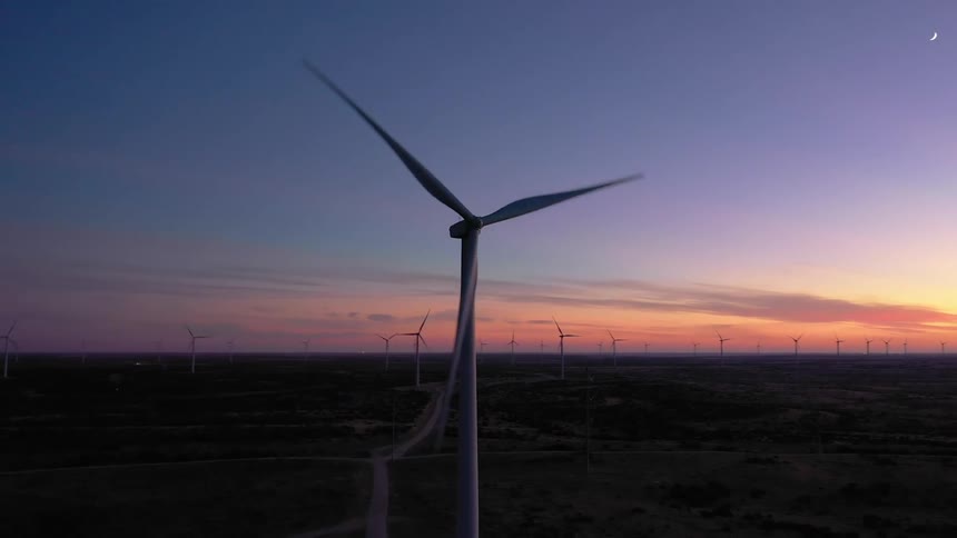 Windmills are moving in a rural area