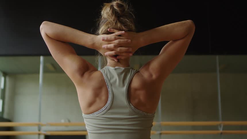 A woman is working out at night