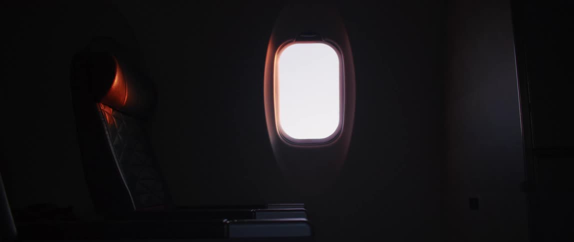 An empty airplane seat inside of an airplane
