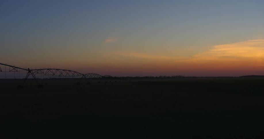 The sun is setting in the horizon