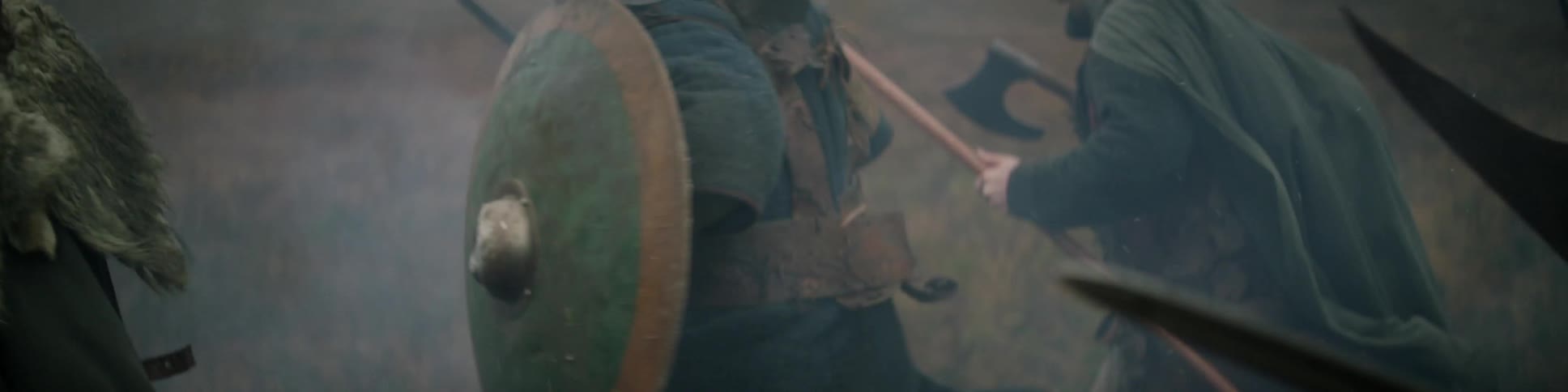 Medieval men running with their weapons and shields