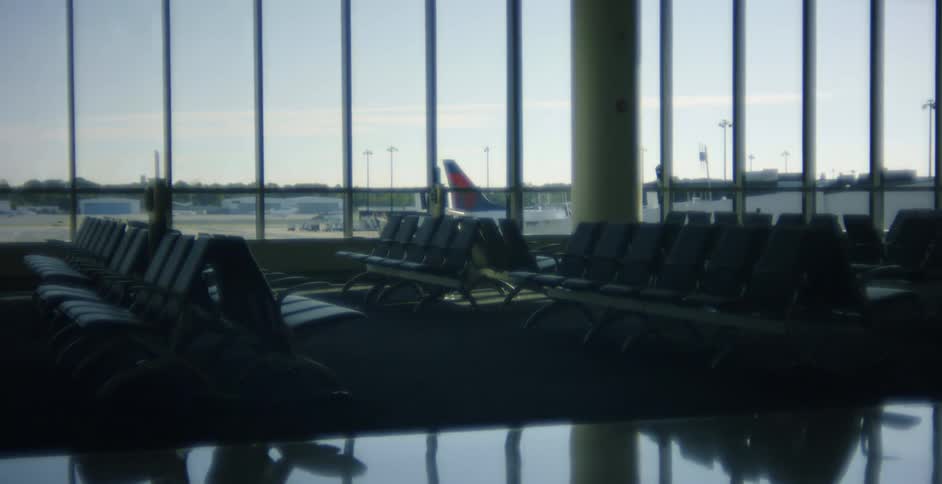 Empty airport terminal full of empty seats