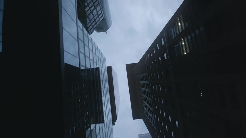 A tower block of office buildings from a ground up view