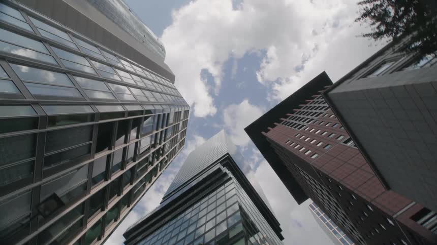 Large metropolitan buildings in a city on a cloudy day