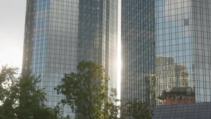 High rise office buildings blocking the sun in a city