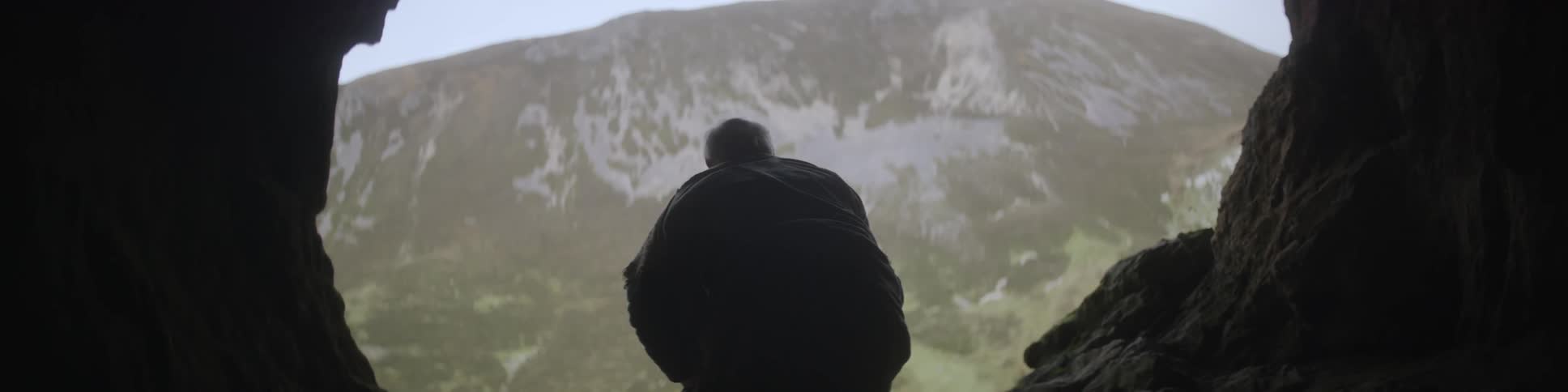 A man walks in the mountains