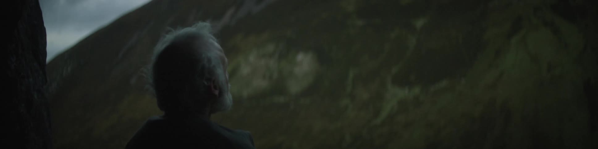 Older man staring out at the scenery