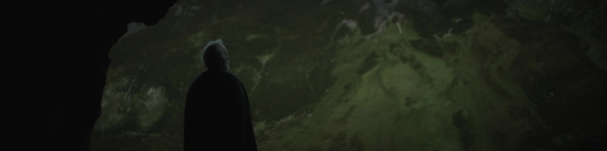 A man is looking at a large area in front of him
