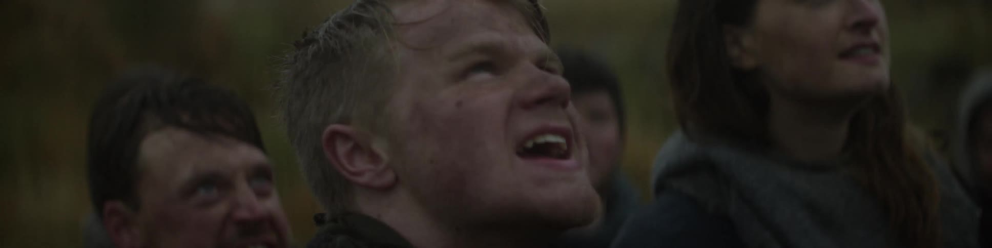 A man nodding and voicing his agreement