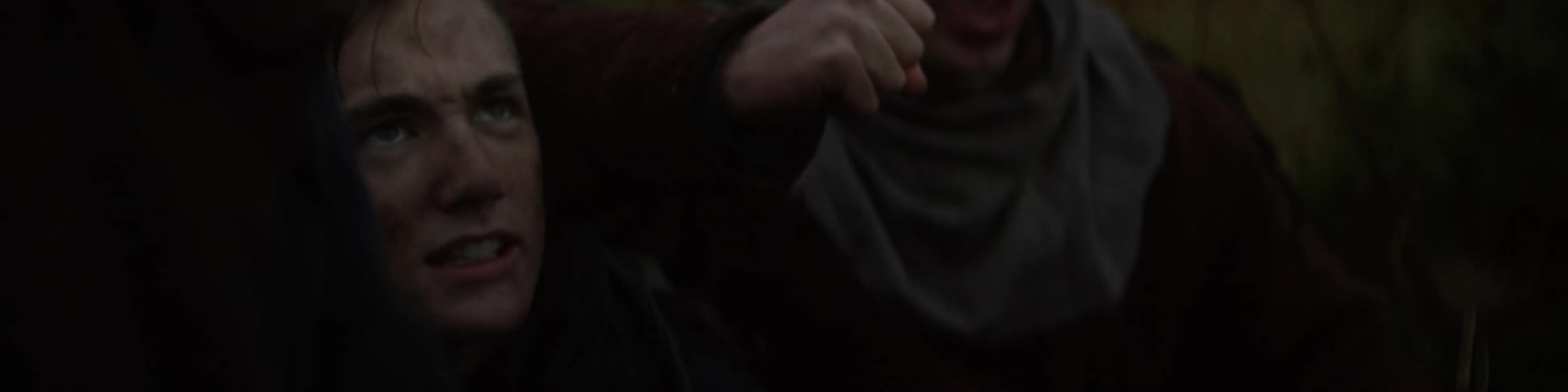 Close up of some men yelling and cheering