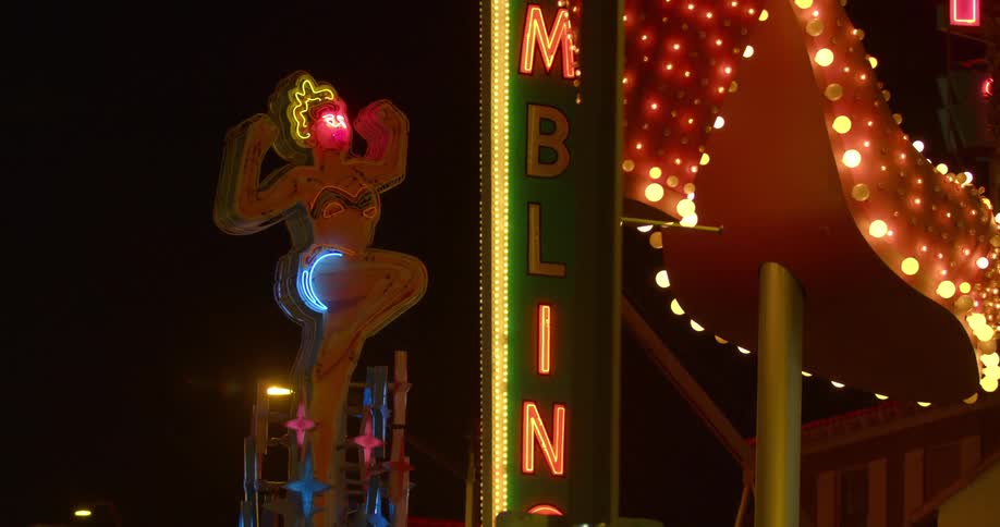 The lights on the building are flashing at night